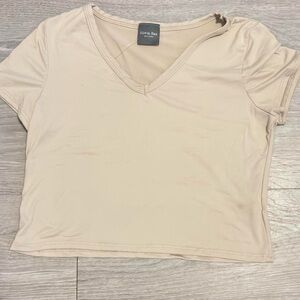 Olivia Rae tan shirt